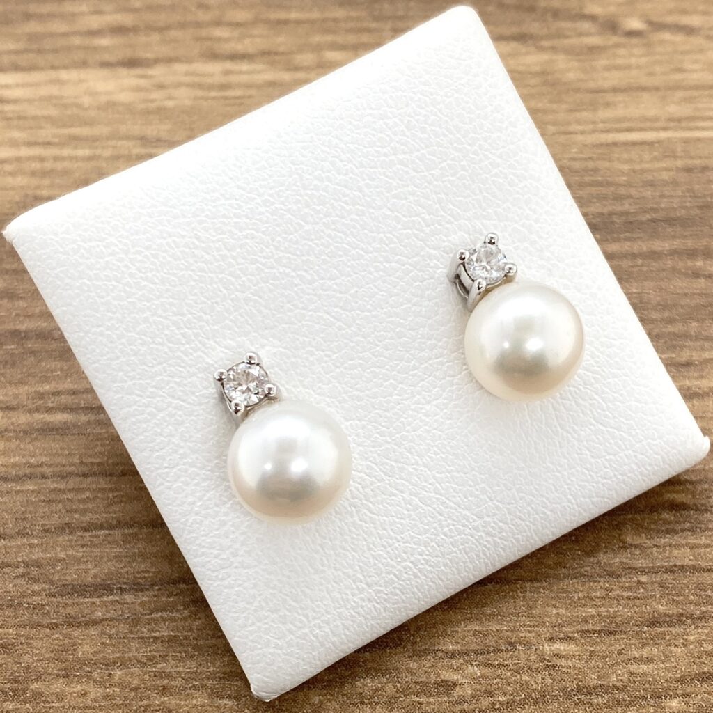 Elegant pearl and diamond earrings.