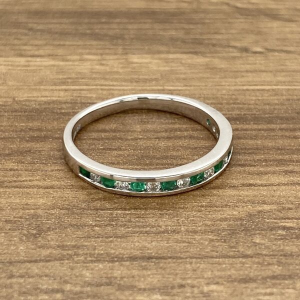 Emerald and diamond eternity band.