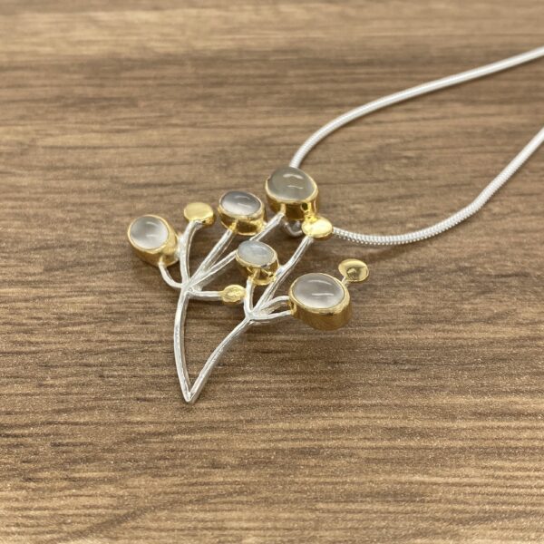 Silver and gold moonstone pendant necklace.