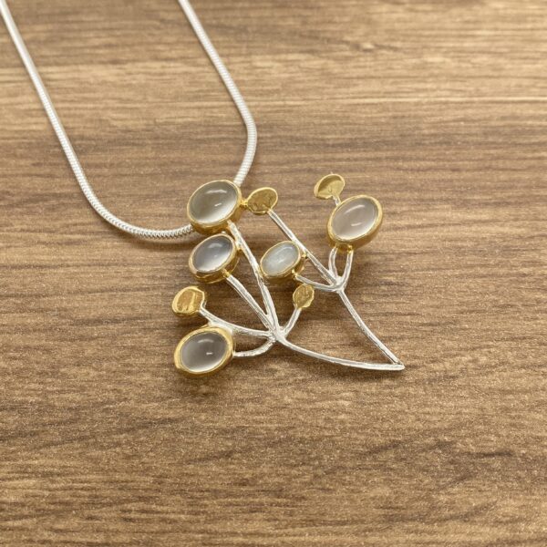 Silver and gold moonstone pendant necklace.