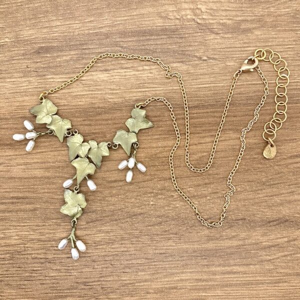 Gold ivy leaf necklace with pearls.