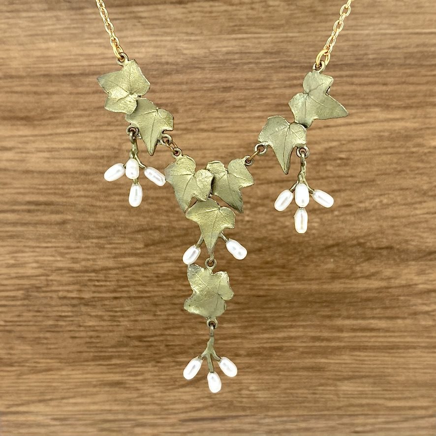 Gold ivy leaf necklace with pearls.