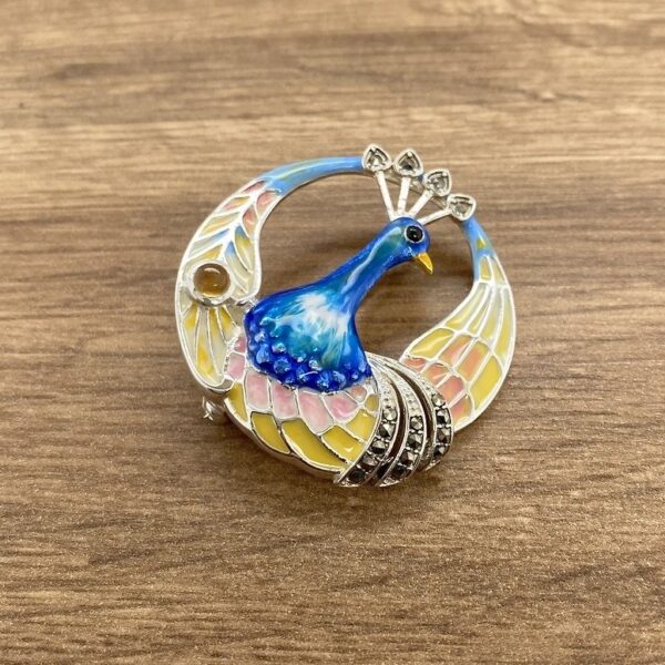 Peacock enamel brooch, pastel colors.