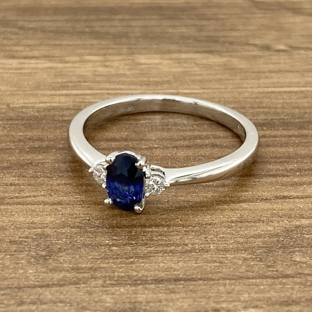 Oval sapphire and diamond ring.