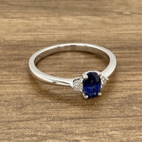 Oval sapphire and diamond ring.