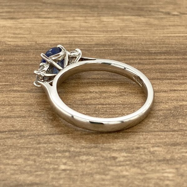 Three-stone sapphire and diamond ring.