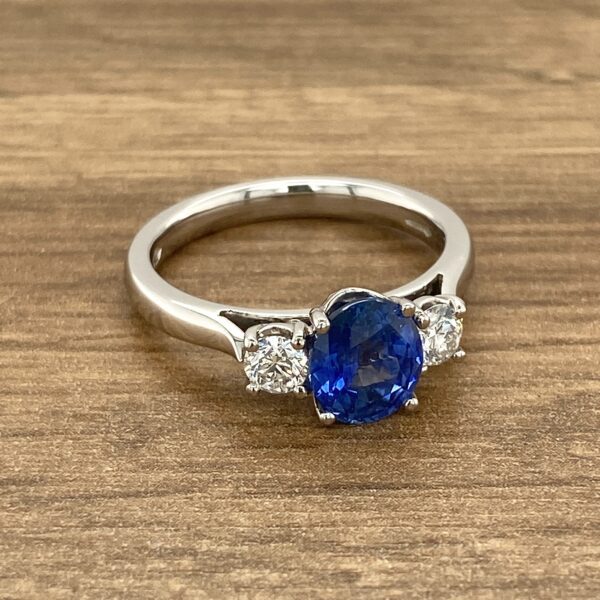 Three-stone sapphire and diamond ring.