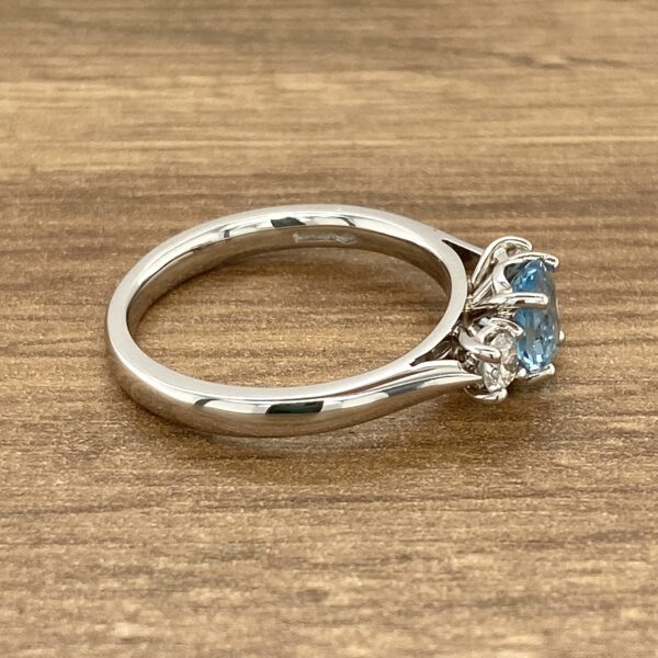 Aquamarine and diamond three-stone ring.