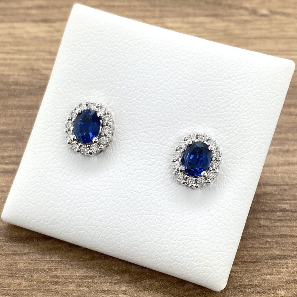 Oval sapphire and diamond stud earrings.