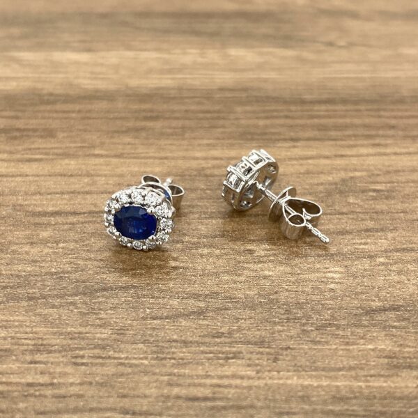 Oval sapphire and diamond earrings.